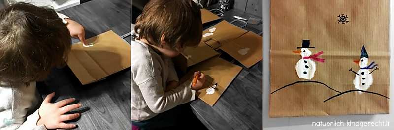 Kind malt mit Fingern Schneemänner auf Geschenktüten